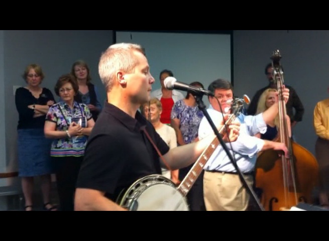 Chris Joslin playing banjo on Bluegrass Sunday